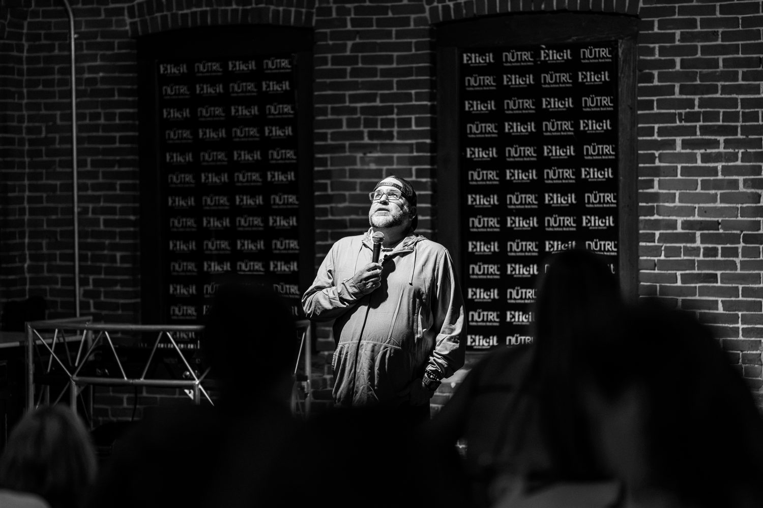 Mike McCue performing on stage